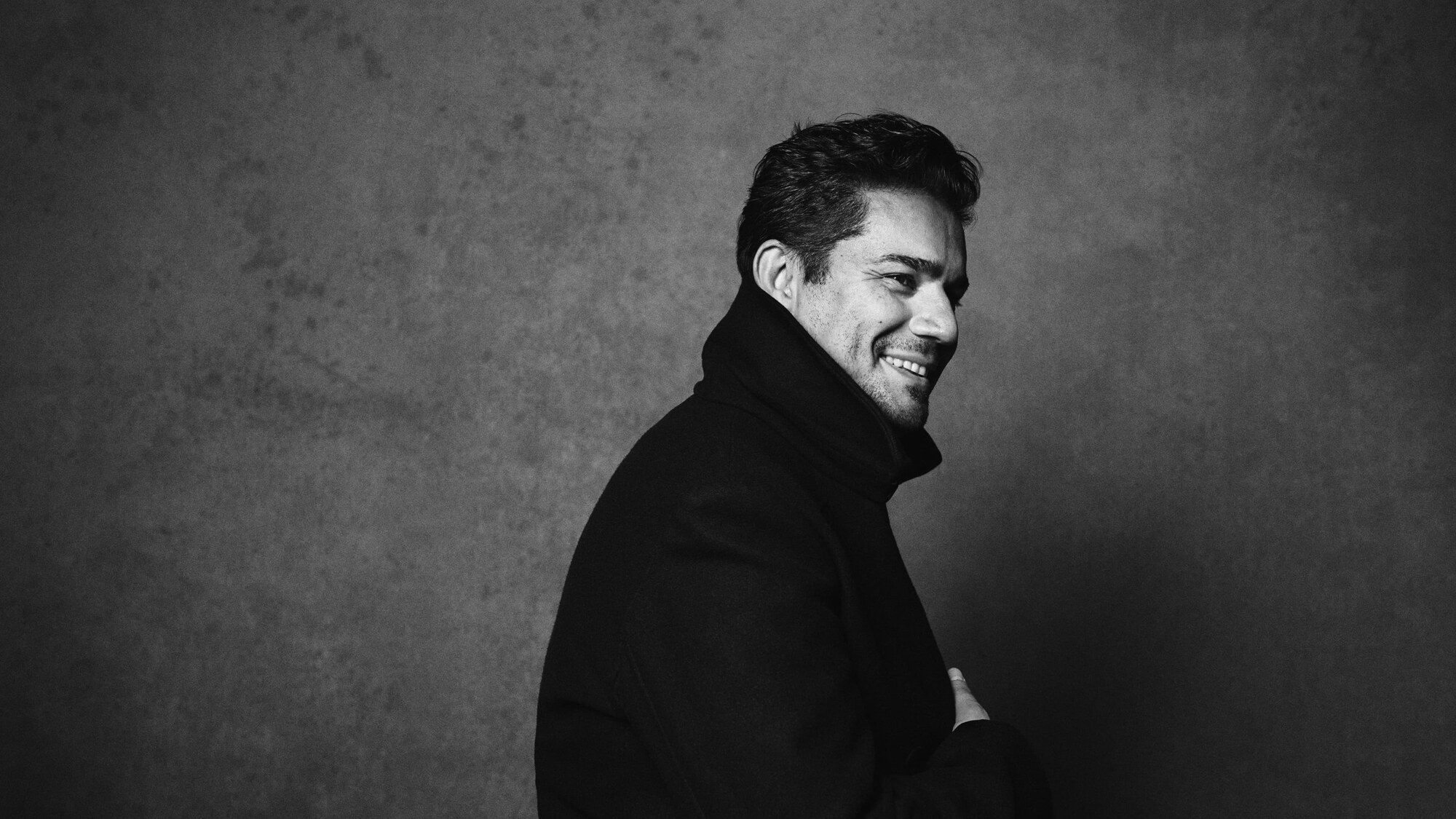 Saimir Pirgu, black and white studio portrait